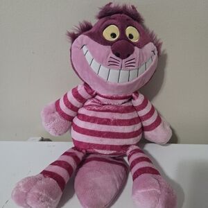 Scentsy Buddy Disney Cheshire Cat plush toy.